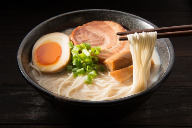 Spicy Pork Ramen with Soft-Boiled Egg and Noodles: A Flavorful Bowl of Comfort